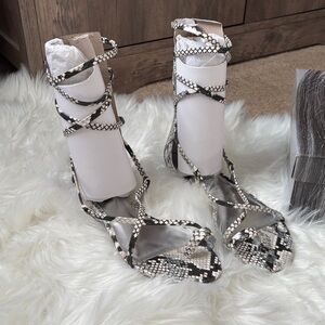 Jennifer Lopez Snake-Print Lace-Up Sandals in Black & White